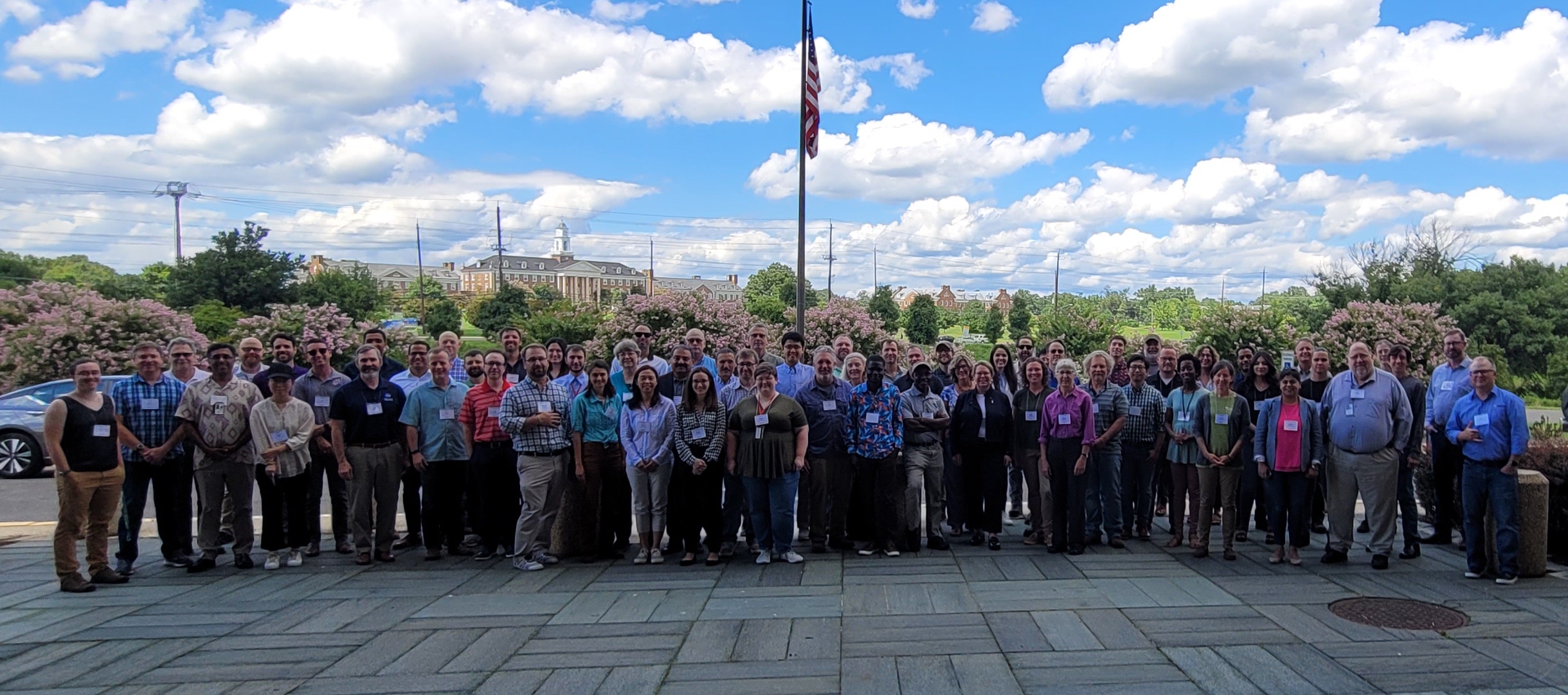 Attendees at the 2023 National Soil Moisture Workshop gather outside.