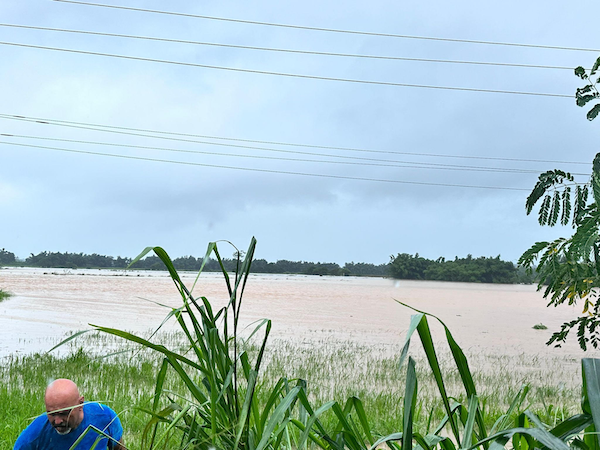 Farmland in a valley is completely flooded after the impact of Tropical Storm Ernesto on August 14. 