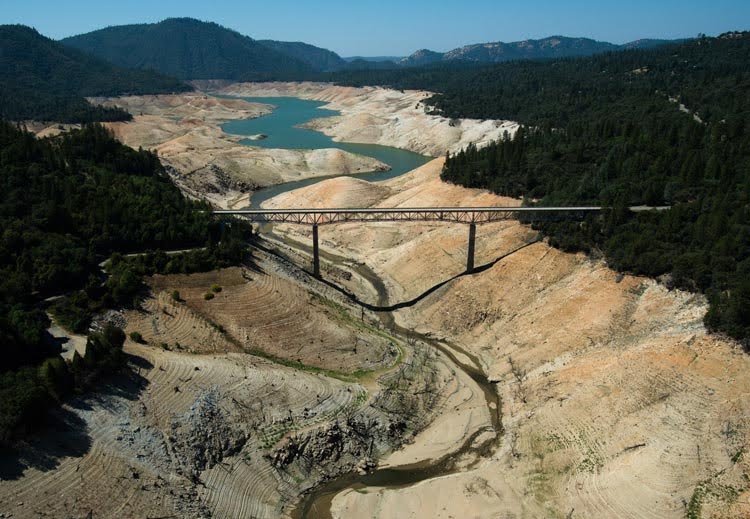 This photo shows California’s largest reservoir, Lake Oroville, nearly dry on August 19, 2014. Credit: California Department of Water Resources.