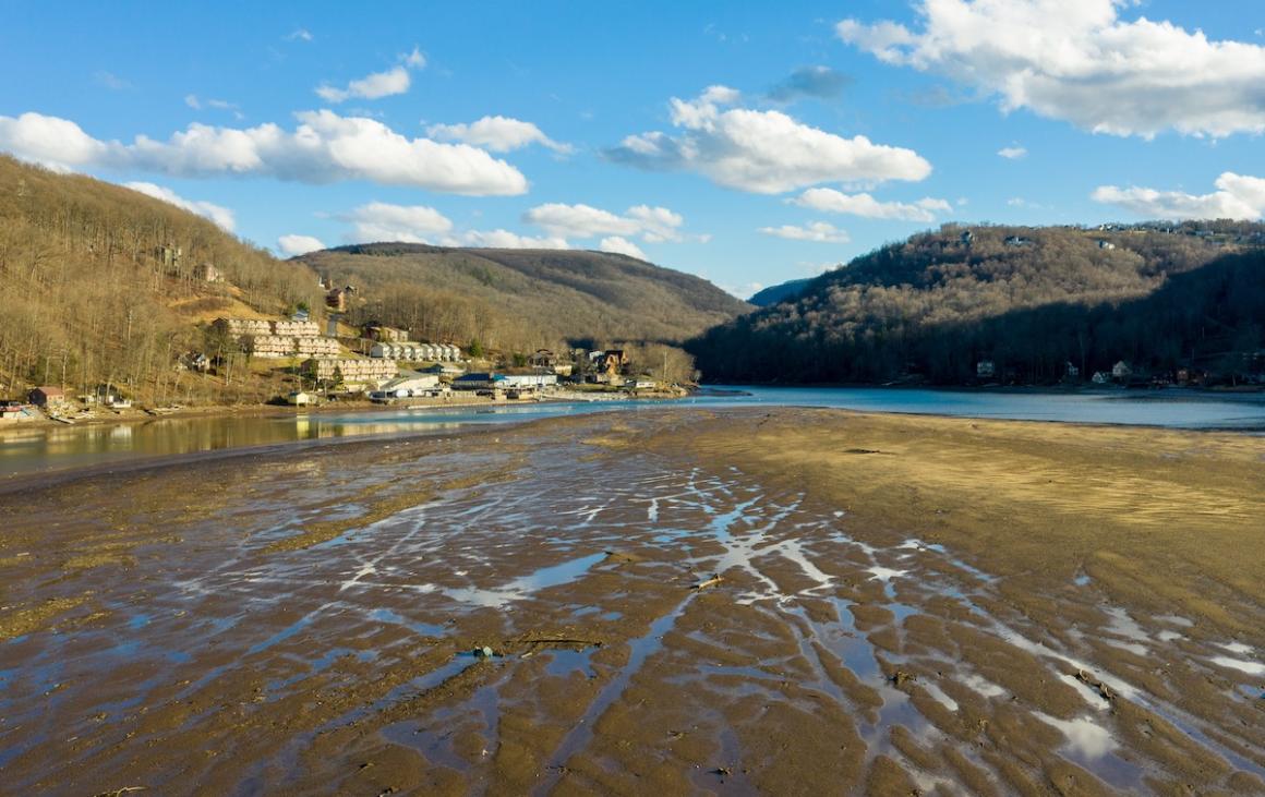 Very low water level in Cheat lake near Morgantown showing a large sand bank where the lake used to be. Photo credit: Nature's Charm, Shutterstock.